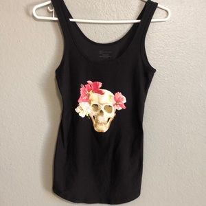 Woman’s black tank top with picture of skull with roses on front. Size Small.